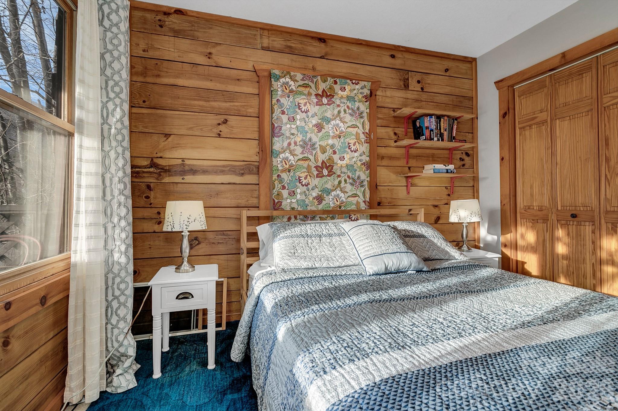 135 Pretty Ridge Maggie Valley, NC 28751 - Photo 35 of 46 a bedroom with a bed and a window