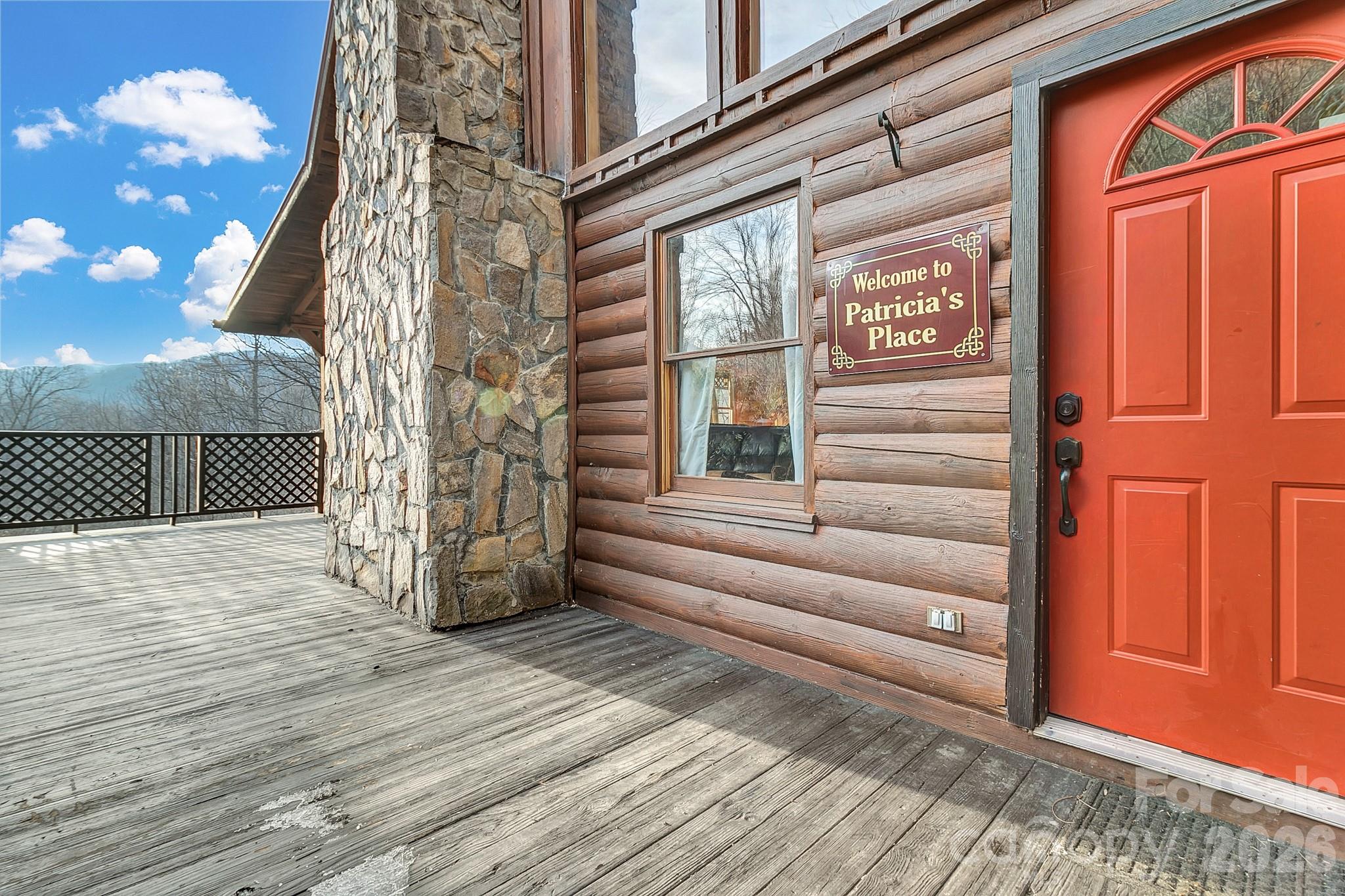 135 Pretty Ridge Maggie Valley, NC 28751 - Photo 4 of 46 a view of a house with a door and wooden floor