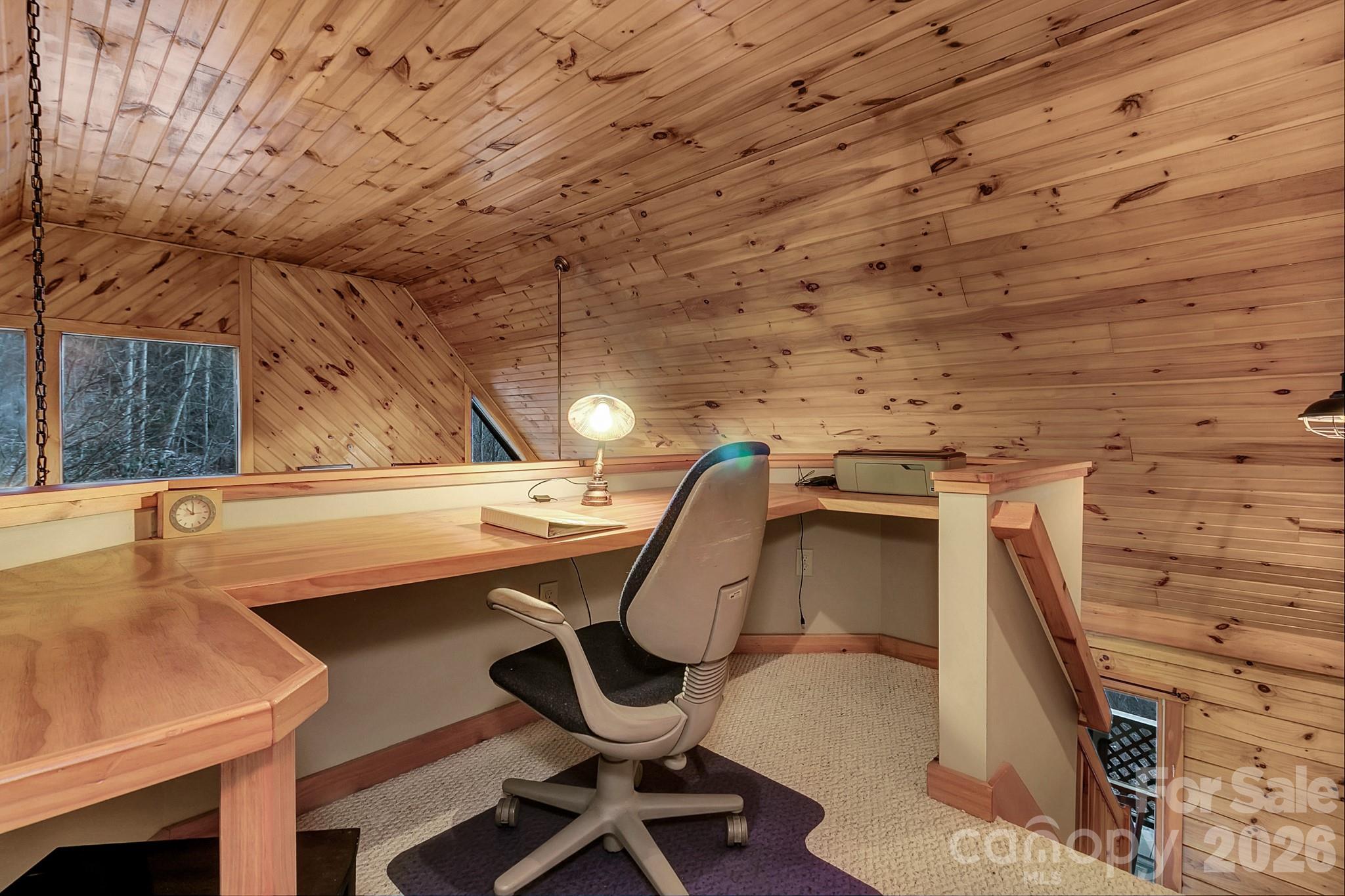 135 Pretty Ridge Maggie Valley, NC 28751 - Photo 42 of 46 a view of a balcony with chairs