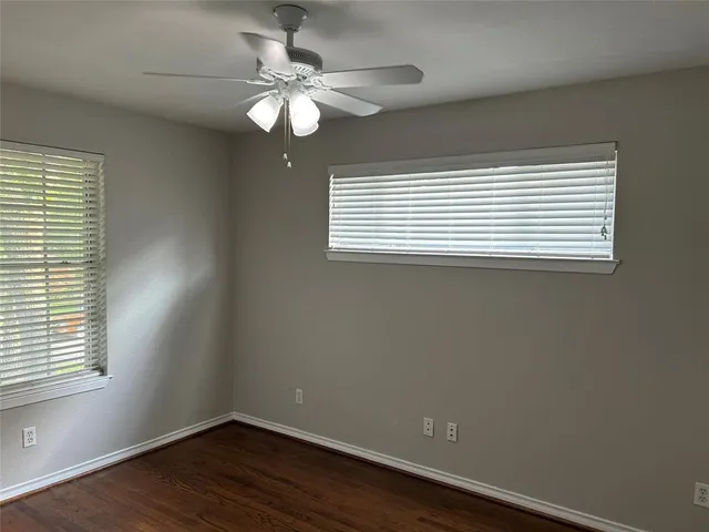 a view of a room that has a window in it