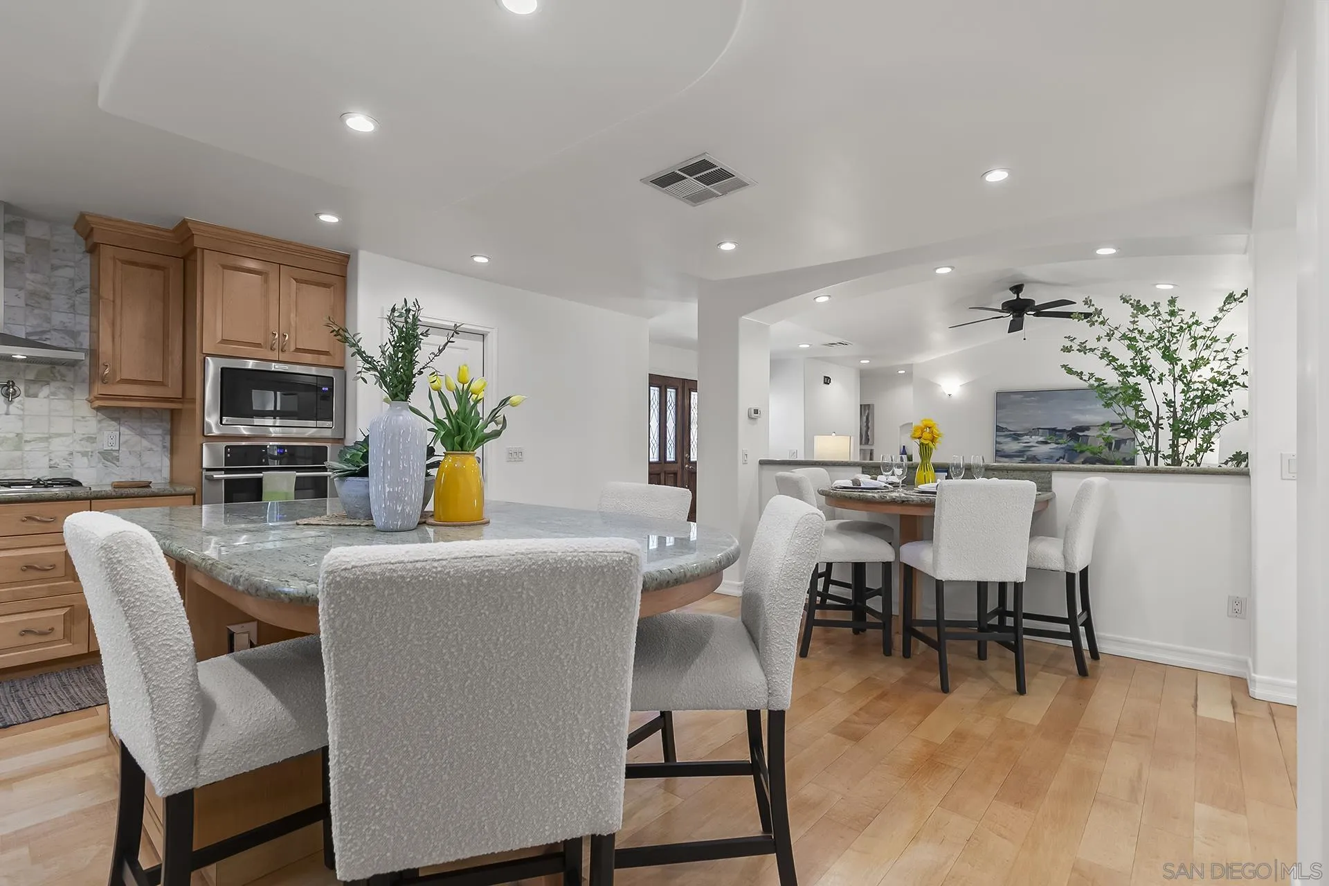 10371 Strathmore Drive Santee, CA 92071 - Photo 12 of 58 a view of a dining room with furniture