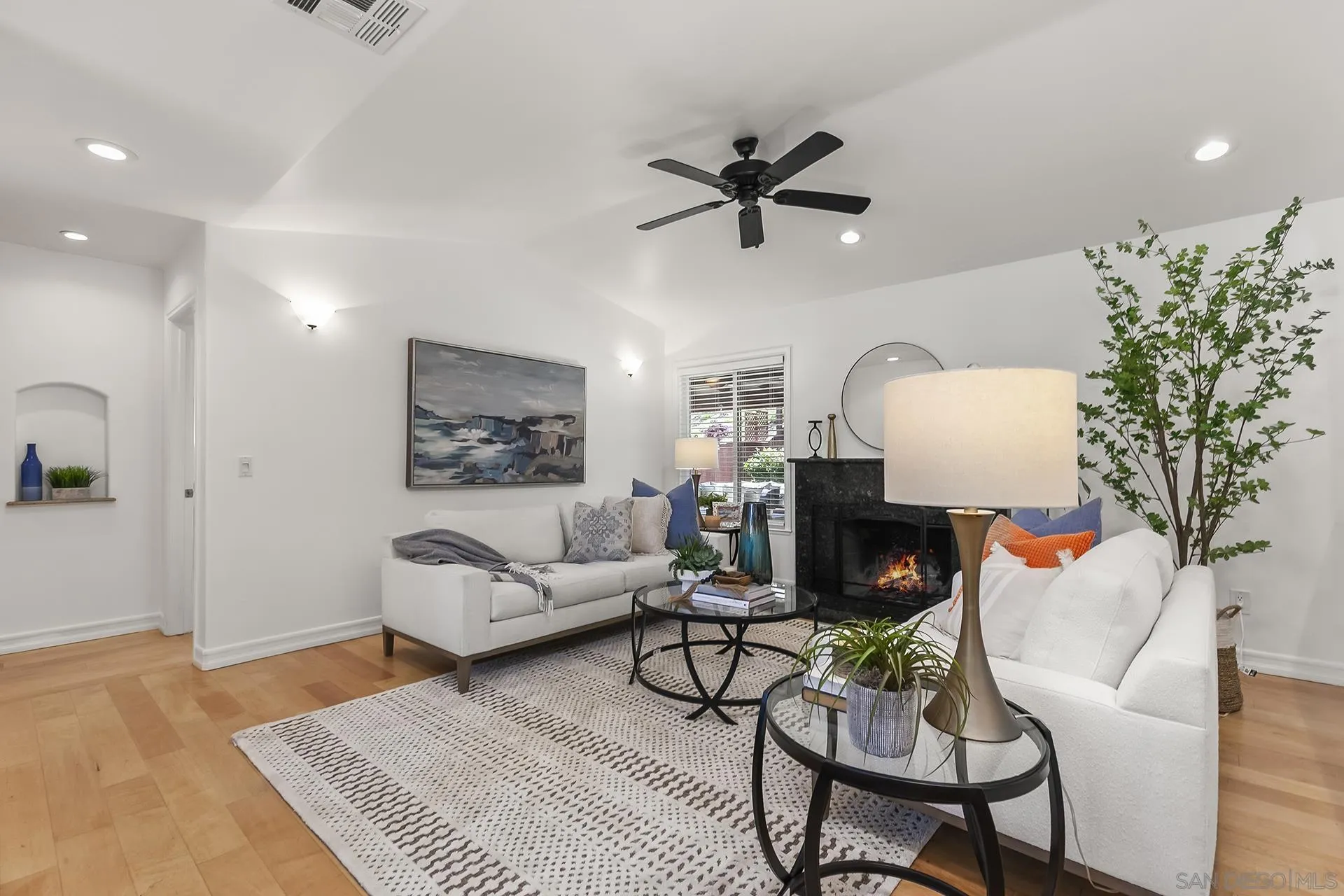 10371 Strathmore Drive Santee, CA 92071 - Photo 13 of 58 a living room with furniture and a wooden floor