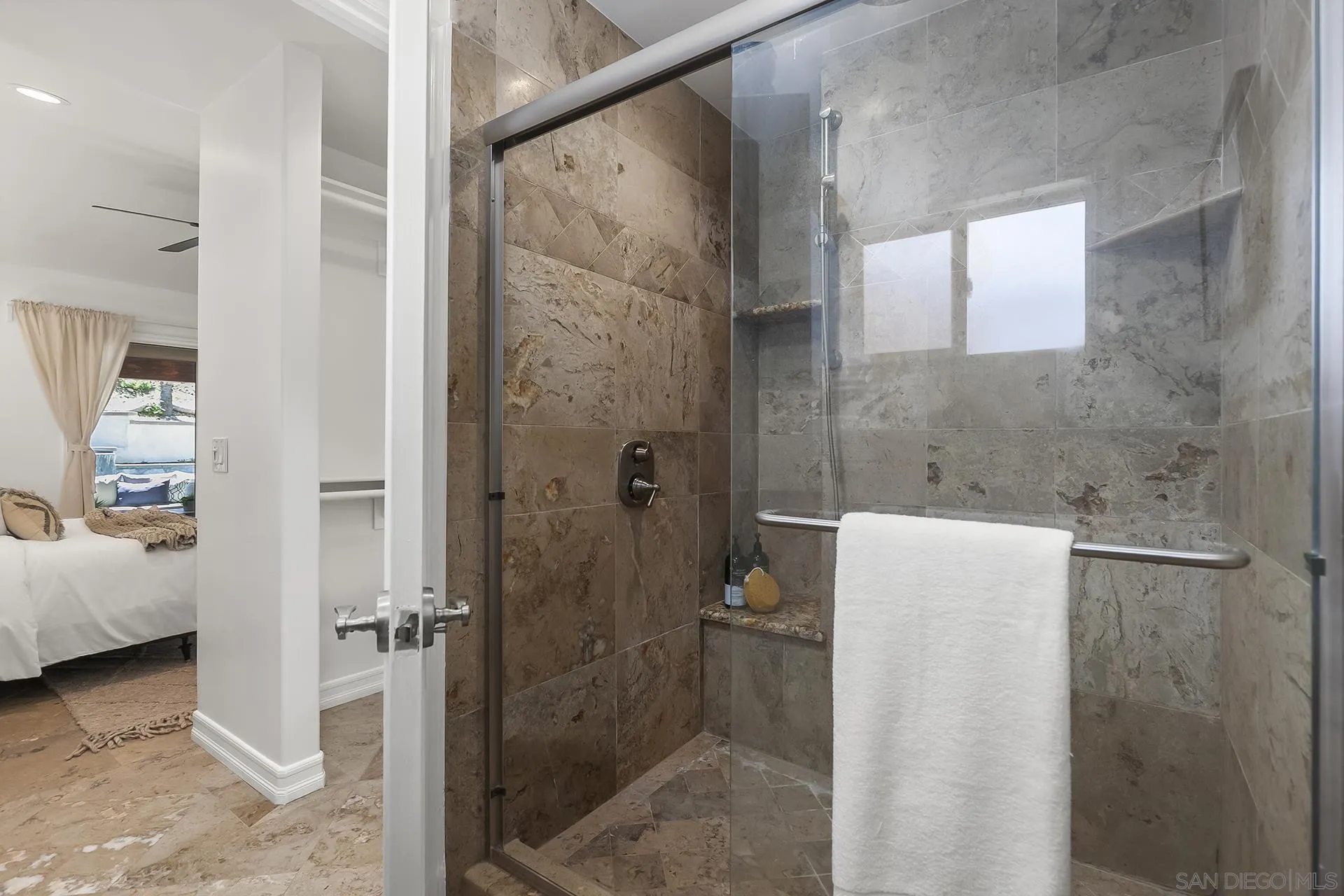 10371 Strathmore Drive Santee, CA 92071 - Photo 34 of 58 a bathroom with a shower