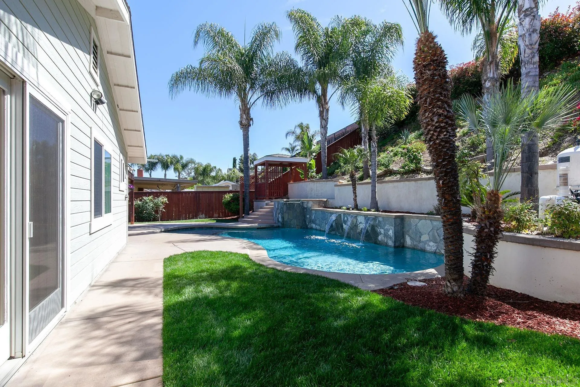 10371 Strathmore Drive Santee, CA 92071 - Photo 50 of 58 a view of a backyard with palm trees