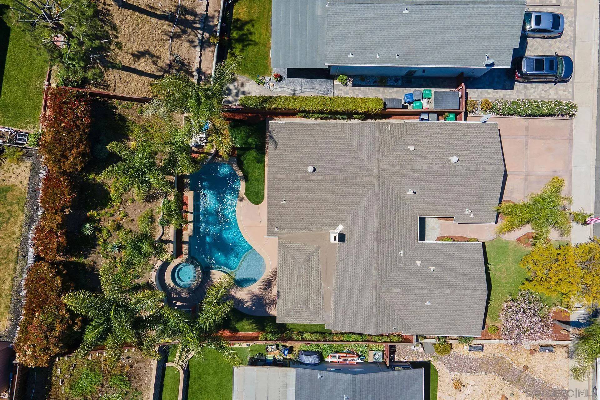 10371 Strathmore Drive Santee, CA 92071 - Photo 56 of 58 an aerial view of residential house with outdoor space and a car park