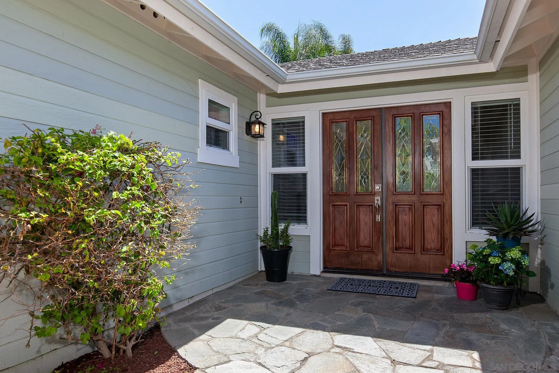 10371 Strathmore Drive Santee, CA 92071 - Photo 6 of 58 a front view of a house
