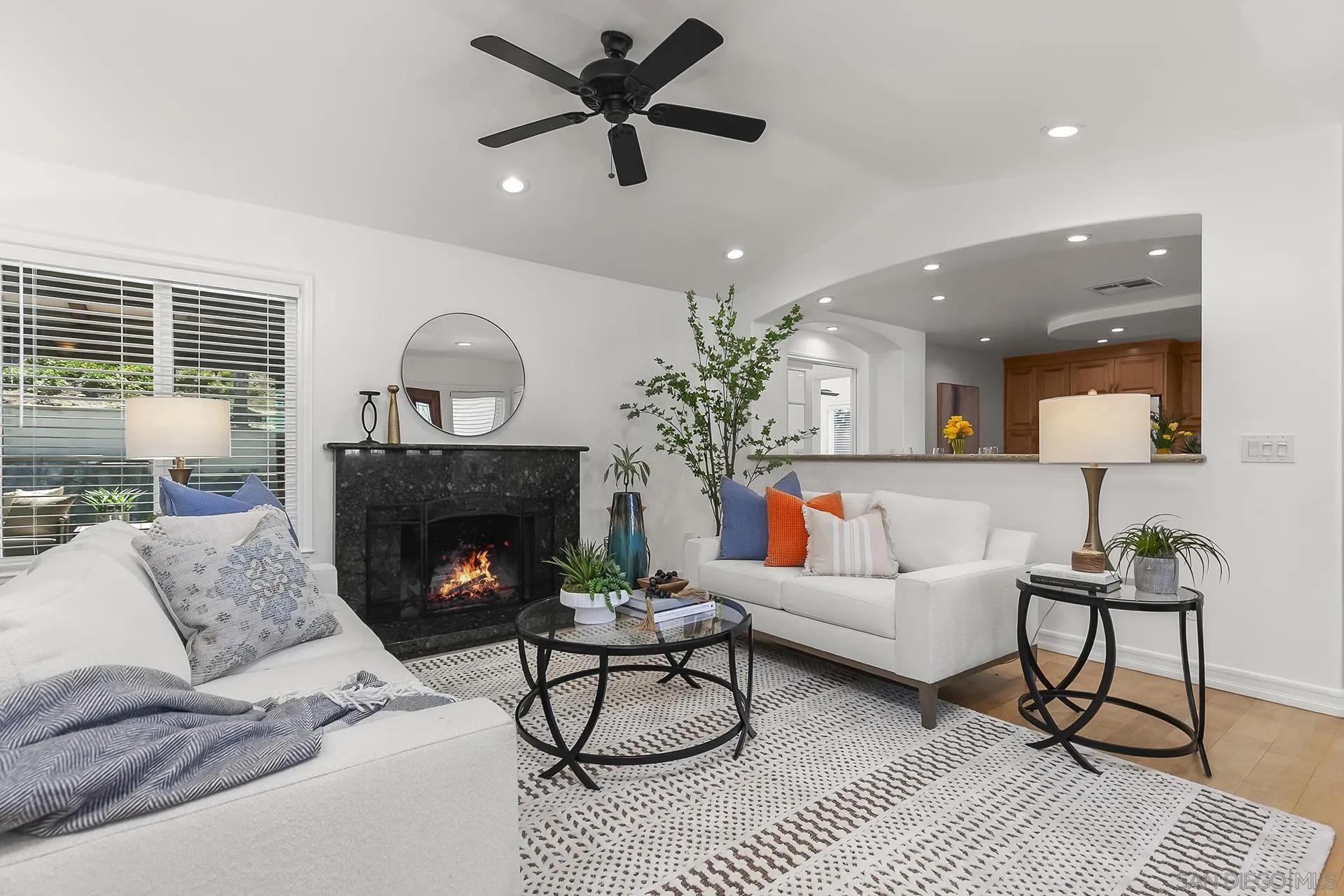 10371 Strathmore Drive Santee, CA 92071 - Photo 10 of 58 a living room with furniture and a fireplace