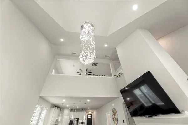 a view of a chandelier in a room