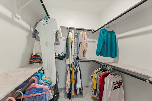 a view of a house with backyard and porch