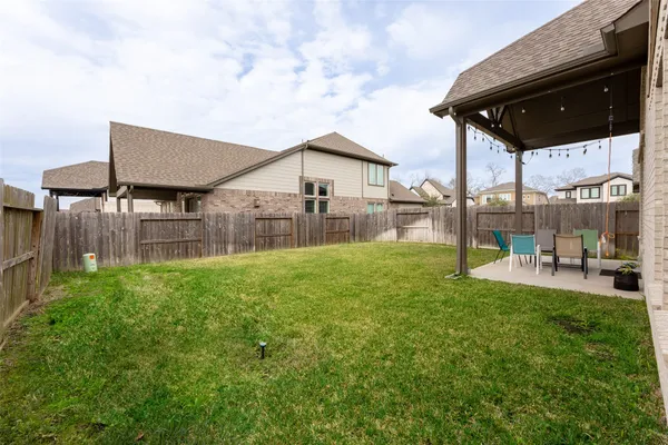 a house view with a garden space