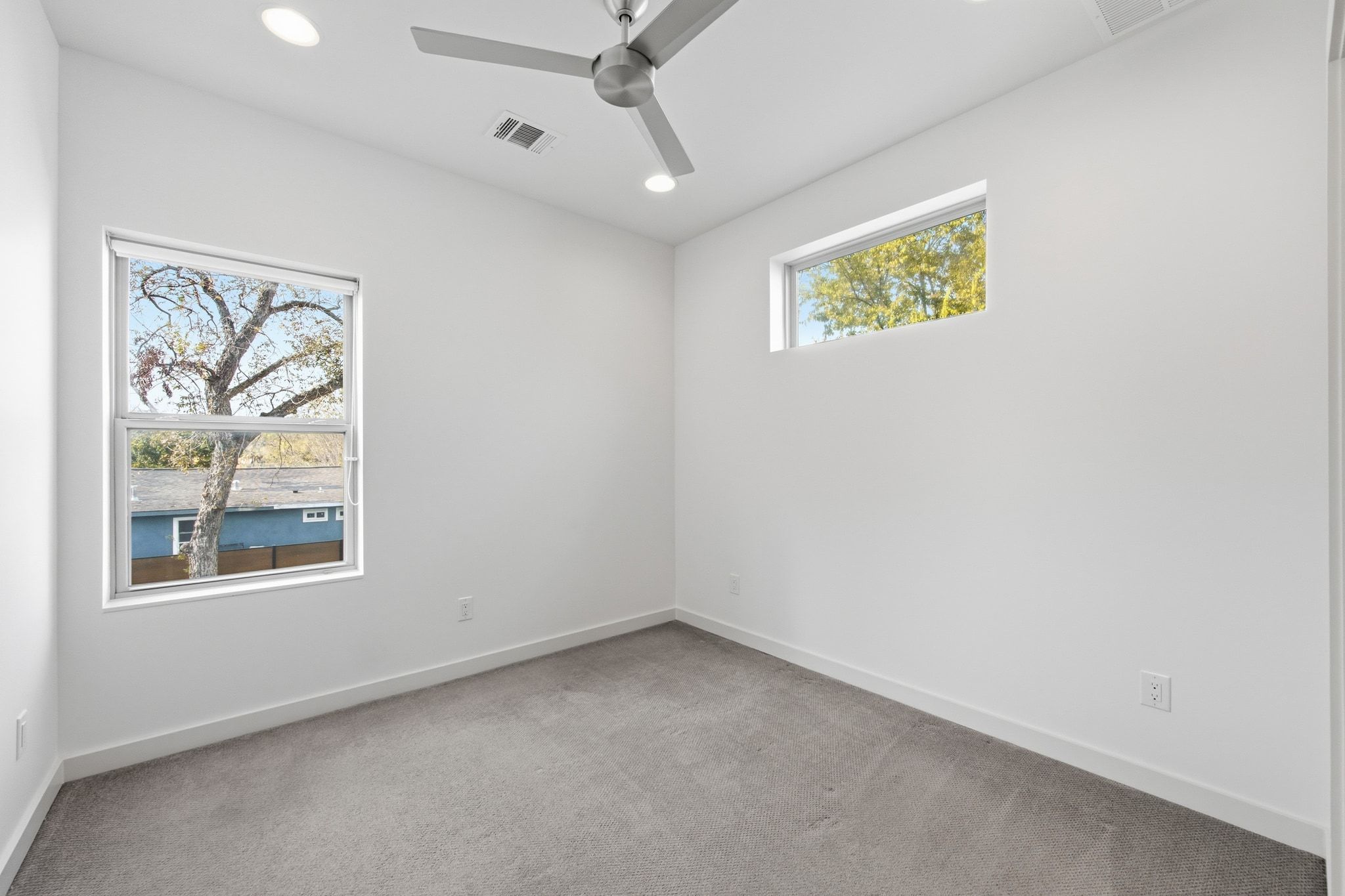 2811 Garwood Street, Unit B Austin, TX 78702 - Photo 22 of 24 Spare room with light carpet, ceiling fan, and recessed lighting