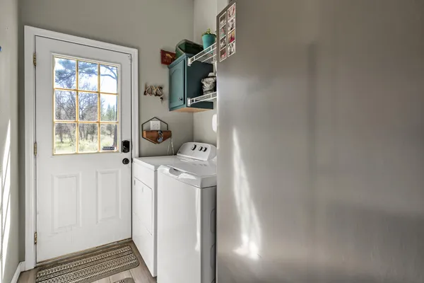 a view of balcony with wooden floor and outdoor seating