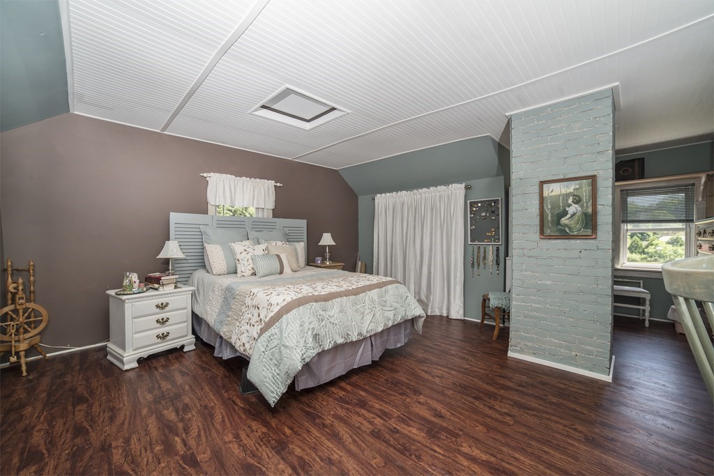 109 Hinsdale Road Northfield, MA 01360 - Photo 16 of 42 a bedroom with a bed and wooden floor