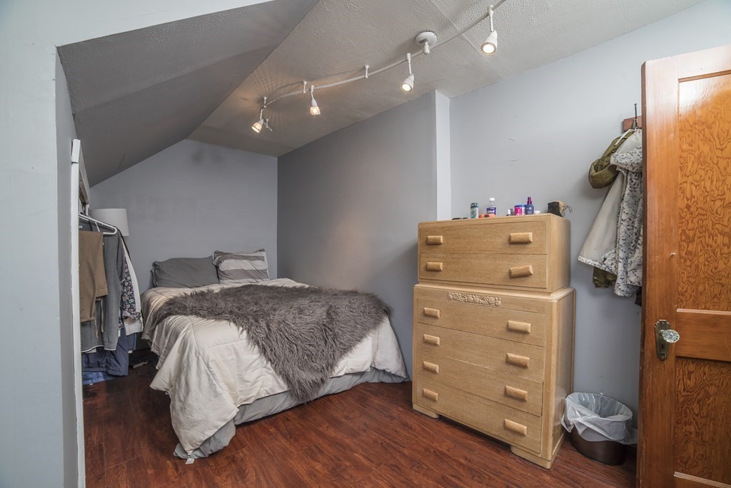 109 Hinsdale Road Northfield, MA 01360 - Photo 20 of 42 a bedroom with a bed and wooden floor
