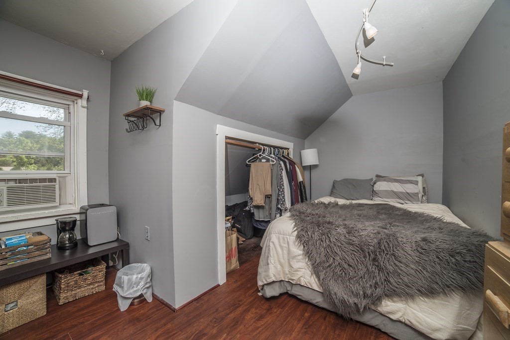 109 Hinsdale Road Northfield, MA 01360 - Photo 21 of 42 a bedroom with a bed and wooden floor