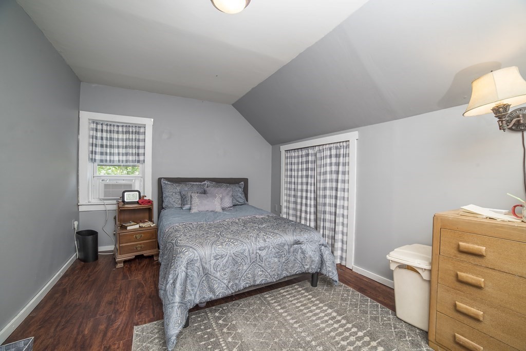 109 Hinsdale Road Northfield, MA 01360 - Photo 23 of 42 a bedroom with a bed and wooden floor