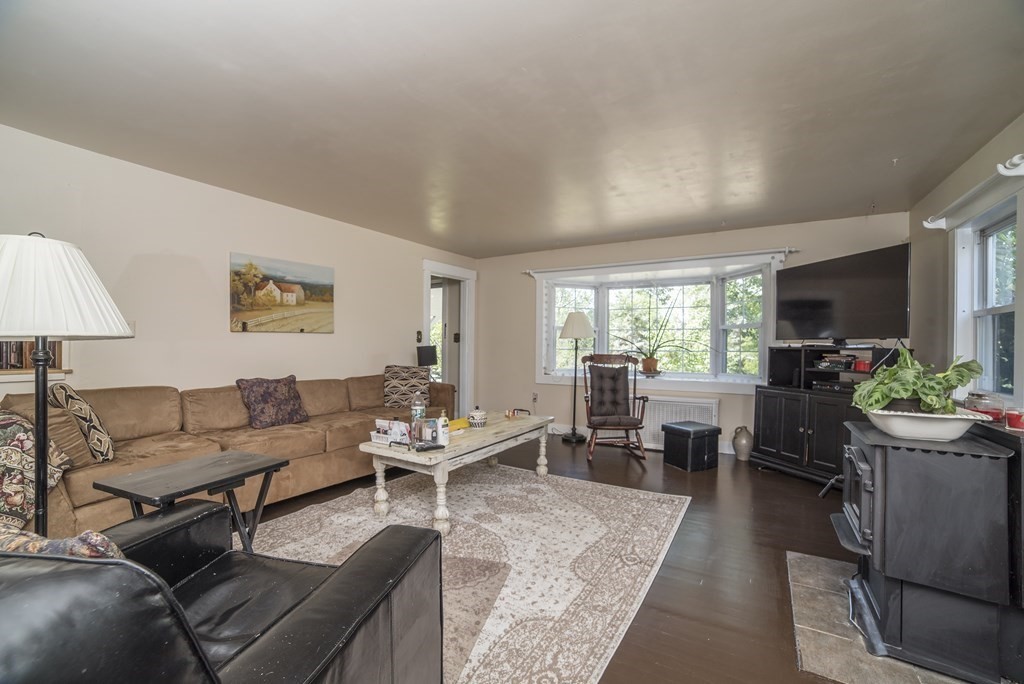 109 Hinsdale Road Northfield, MA 01360 - Photo 4 of 42 a living room with furniture and a flat screen tv