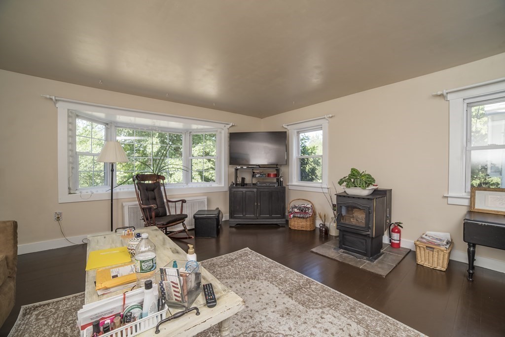 109 Hinsdale Road Northfield, MA 01360 - Photo 5 of 42 a living room with furniture and a flat screen tv