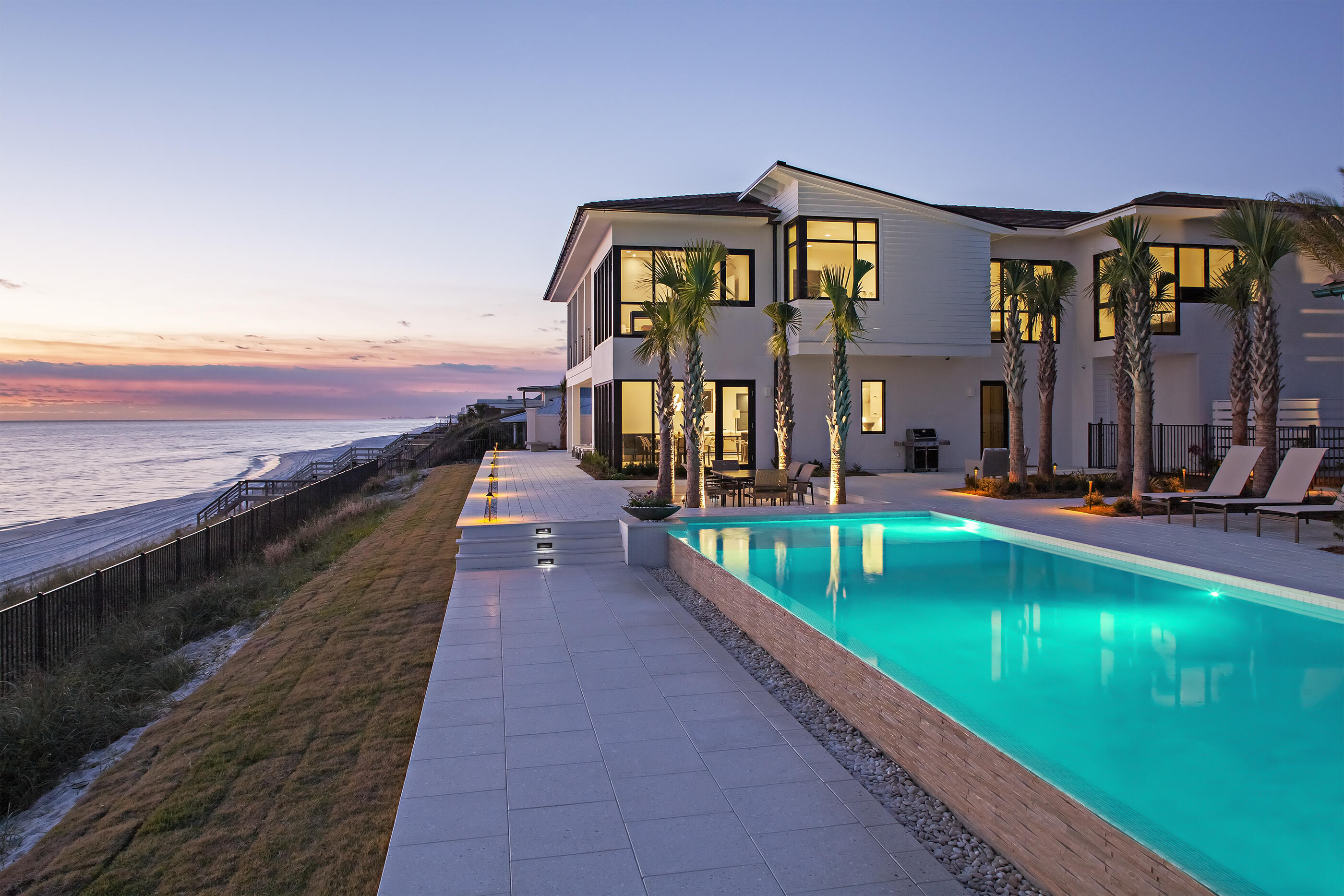 59 Pelican Circle Seacrest, FL 32461 - Photo 106 of 122 a view of a big building with a big yard and large trees