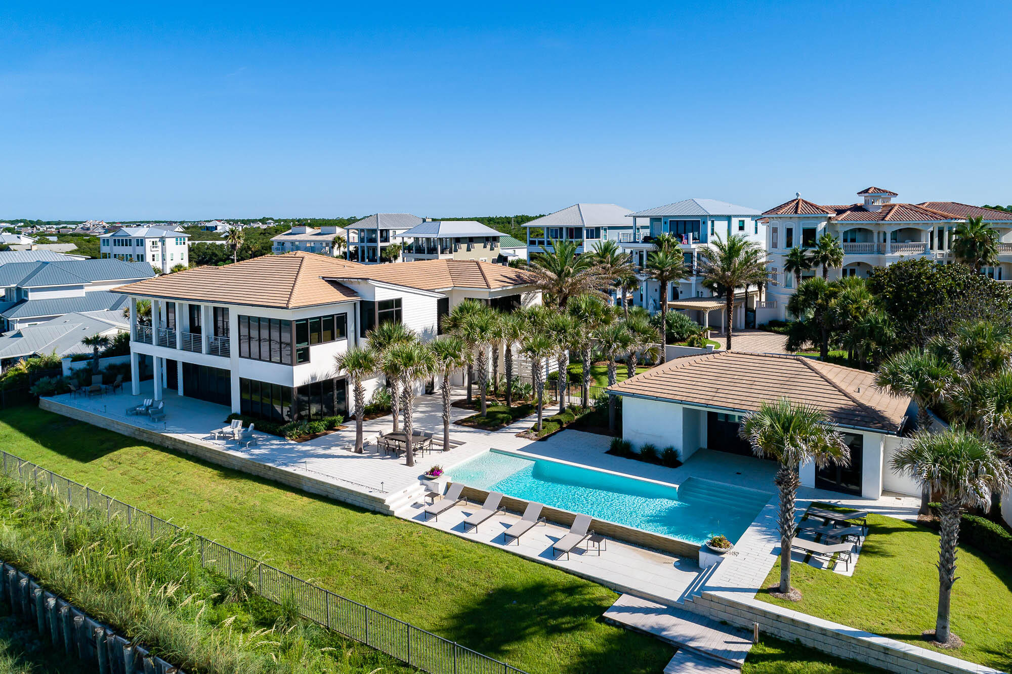 59 Pelican Circle Seacrest, FL 32461 - Photo 3 of 122 an aerial view of a house with swimming pool garden and patio