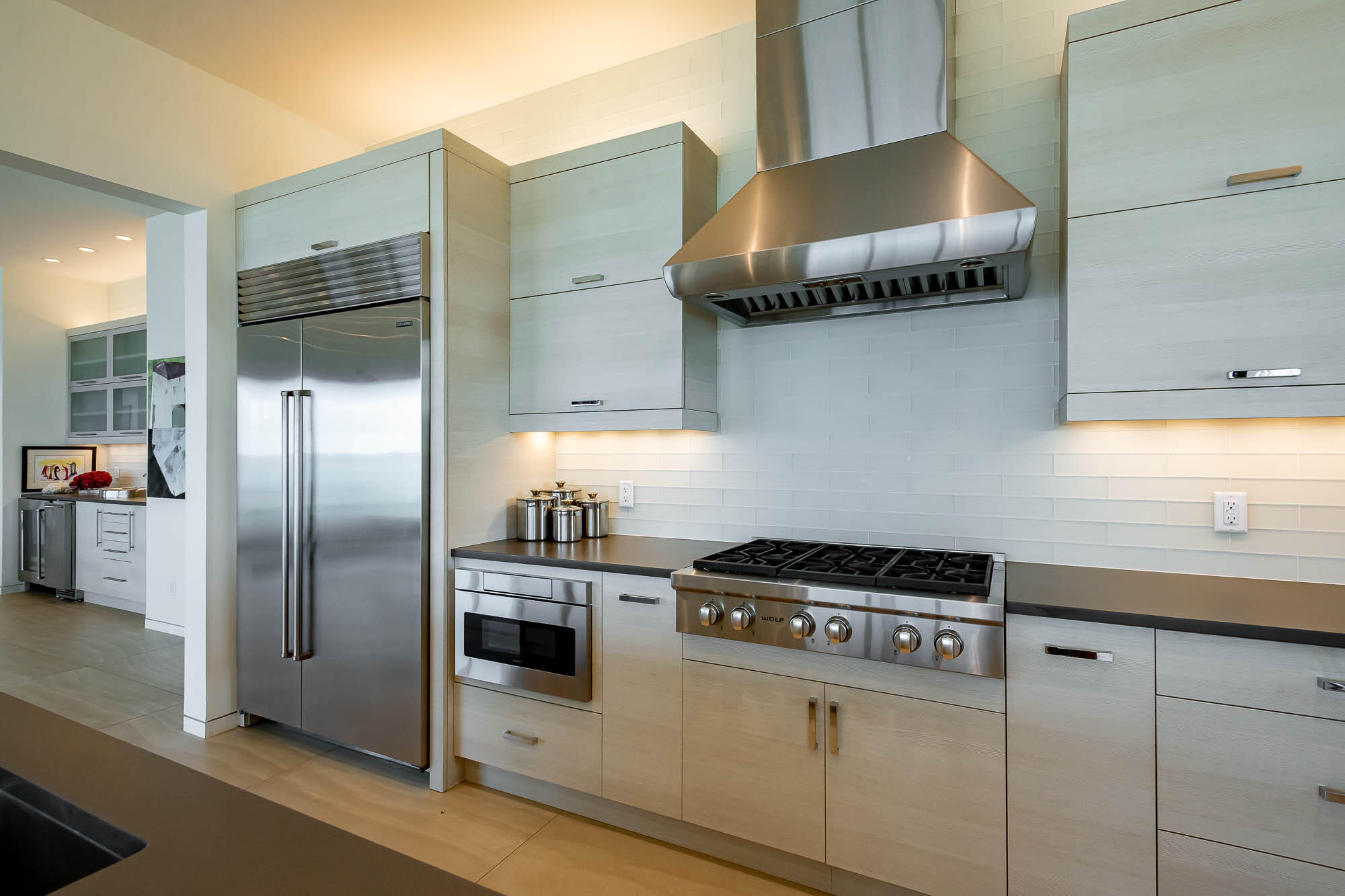 59 Pelican Circle Seacrest, FL 32461 - Photo 34 of 122 a kitchen with stainless steel appliances granite countertop a stove a refrigerator and a sink