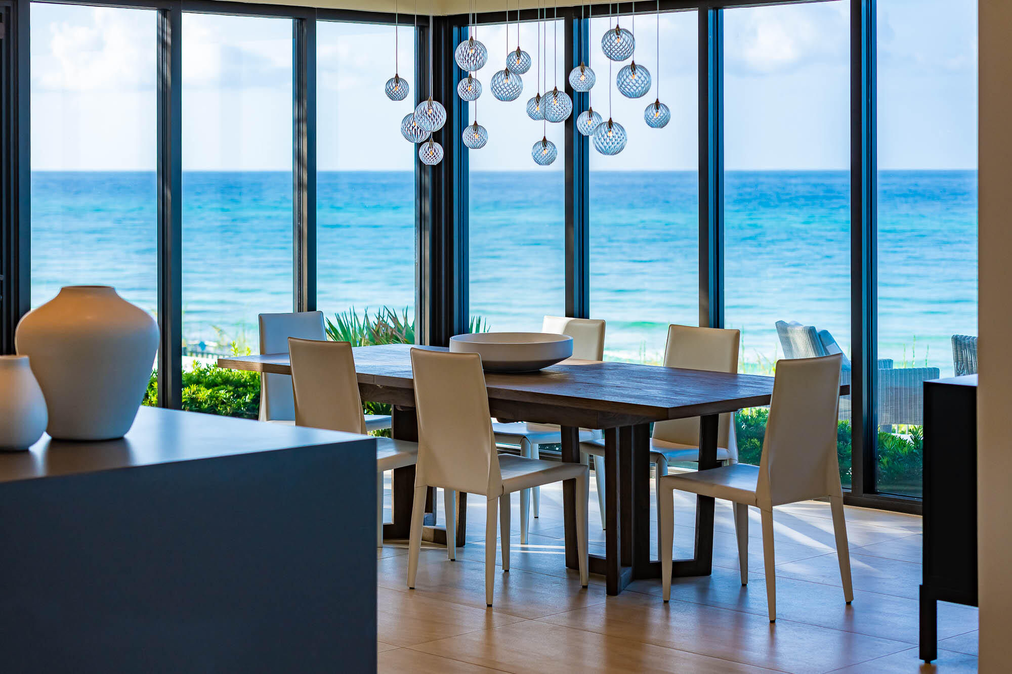 59 Pelican Circle Seacrest, FL 32461 - Photo 38 of 122 a view of a dining room with furniture and wooden floor