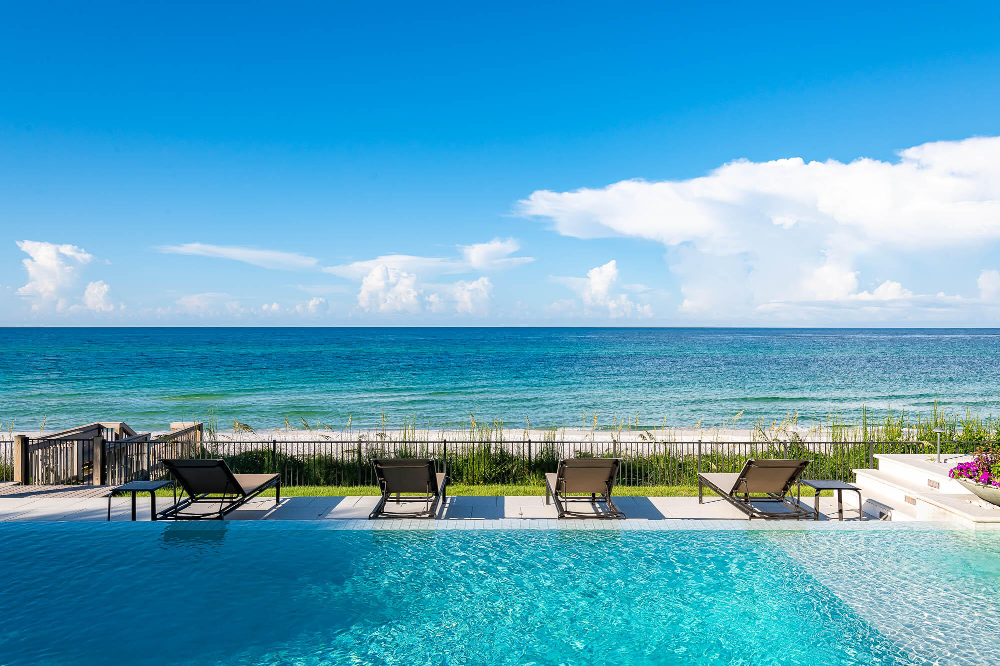 59 Pelican Circle Seacrest, FL 32461 - Photo 46 of 122 a view of a swimming pool with an outdoor seating and a yard