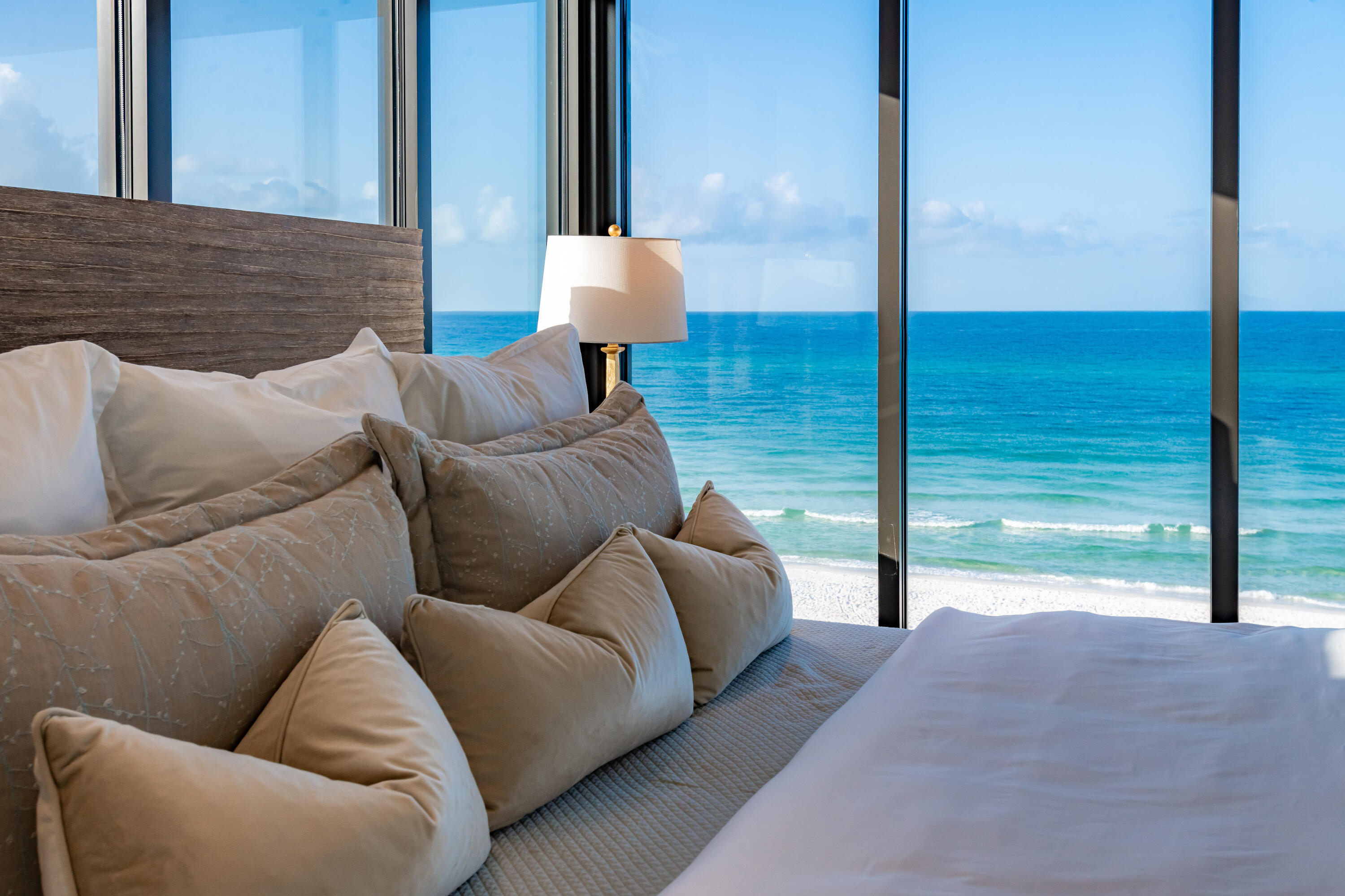 59 Pelican Circle Seacrest, FL 32461 - Photo 64 of 122 a living room with furniture view and a floor to ceiling window