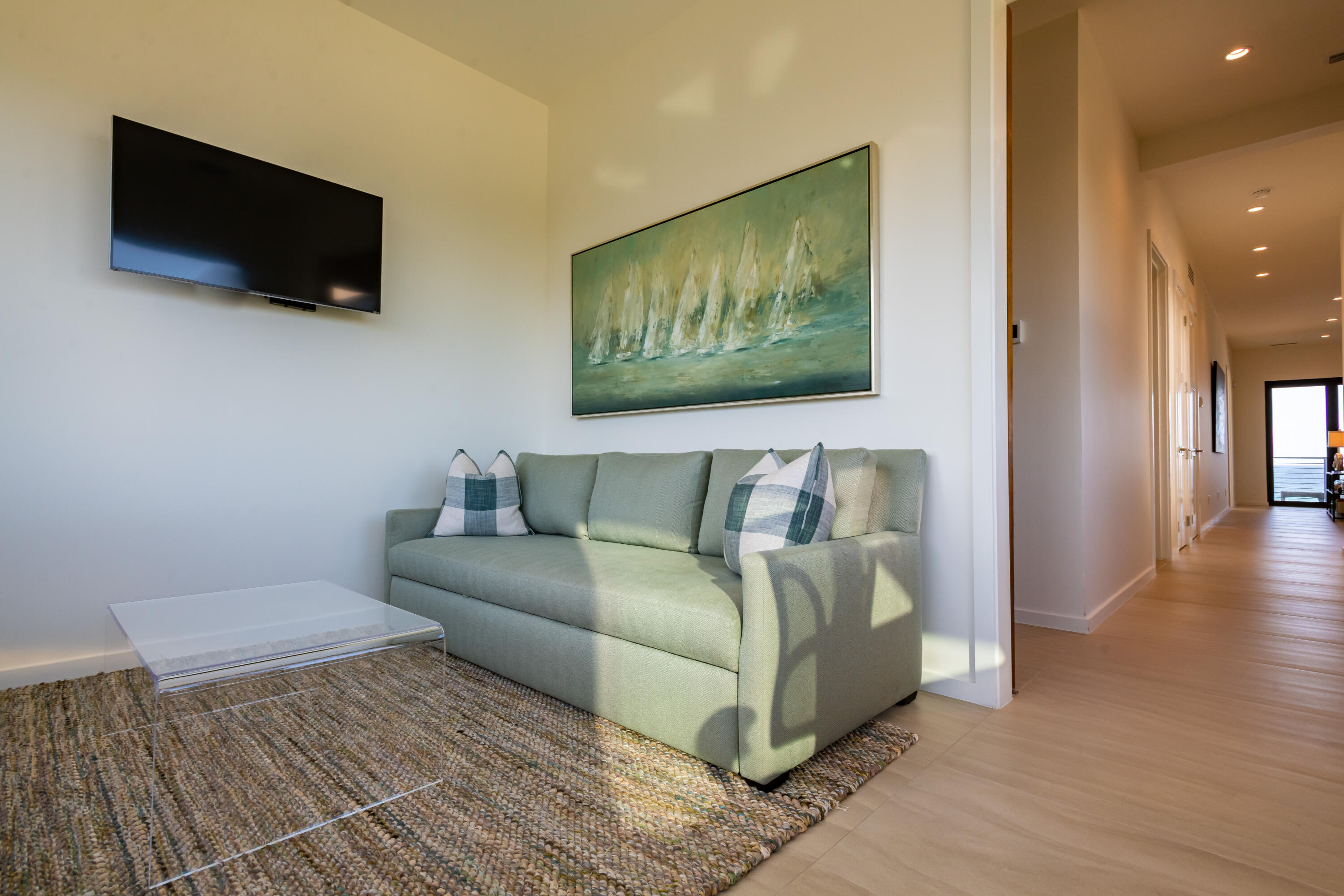 59 Pelican Circle Seacrest, FL 32461 - Photo 75 of 122 a living room with furniture and a flat screen tv