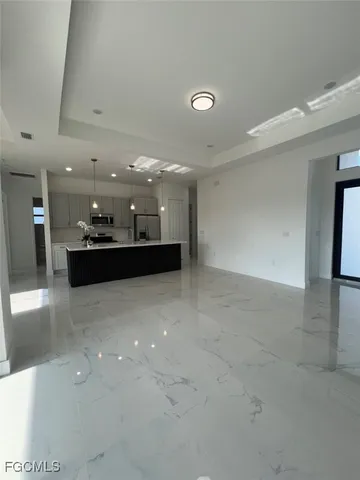 an empty room with a bathroom