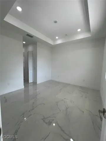 a bathroom with a glass door shower