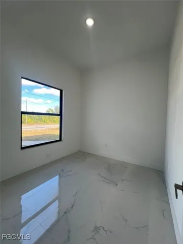 a bathroom with a sink and vanity