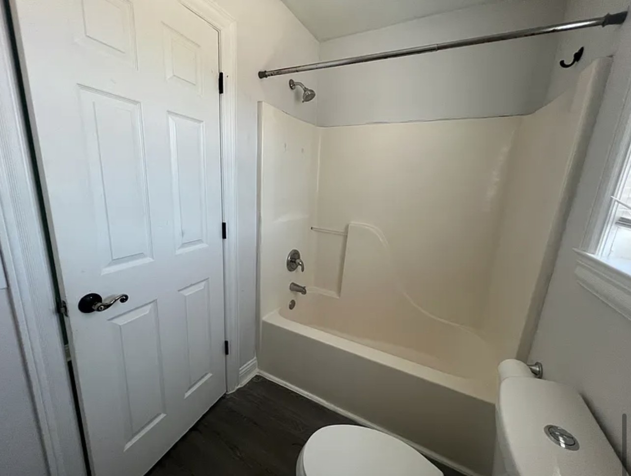 5465 Burnt Knob Road Murfreesboro, TN 37129 - Photo 11 of 14 a bathroom with a shower and a toilet