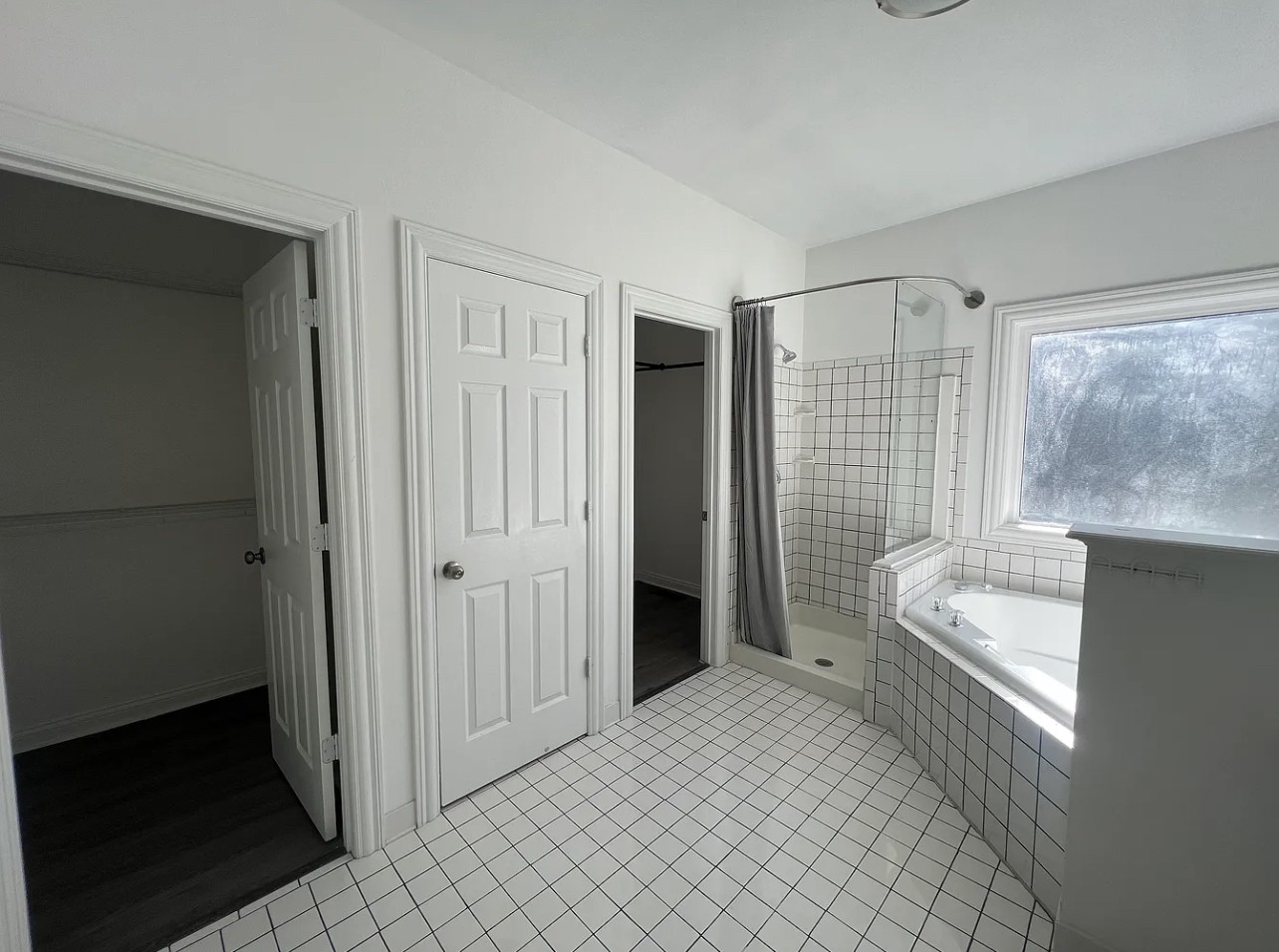 5465 Burnt Knob Road Murfreesboro, TN 37129 - Photo 13 of 14 a spacious bedroom with a large bed and a walk in closet