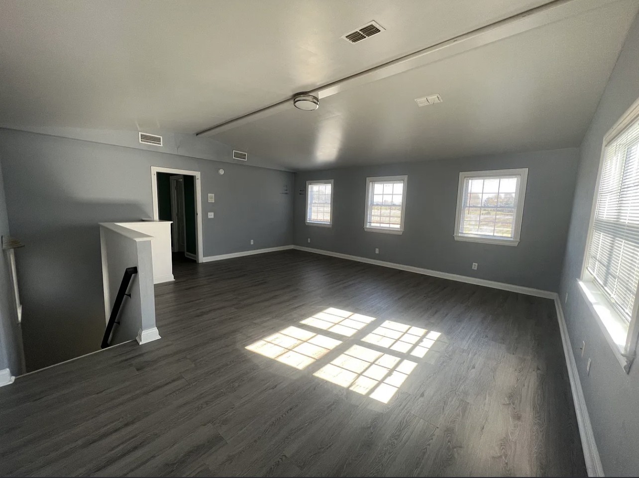 5465 Burnt Knob Road Murfreesboro, TN 37129 - Photo 14 of 14 a view of an empty room with window and wooden floor
