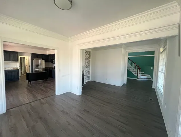 wooden floor in a hall with an entryway