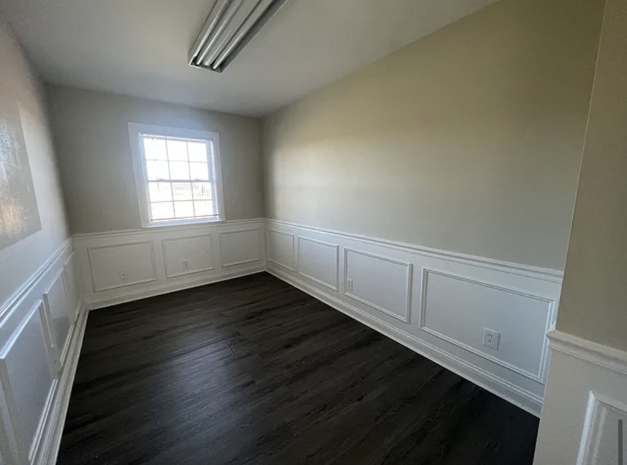 5465 Burnt Knob Road Murfreesboro, TN 37129 - Photo 9 of 14 an empty room with wooden floor and windows