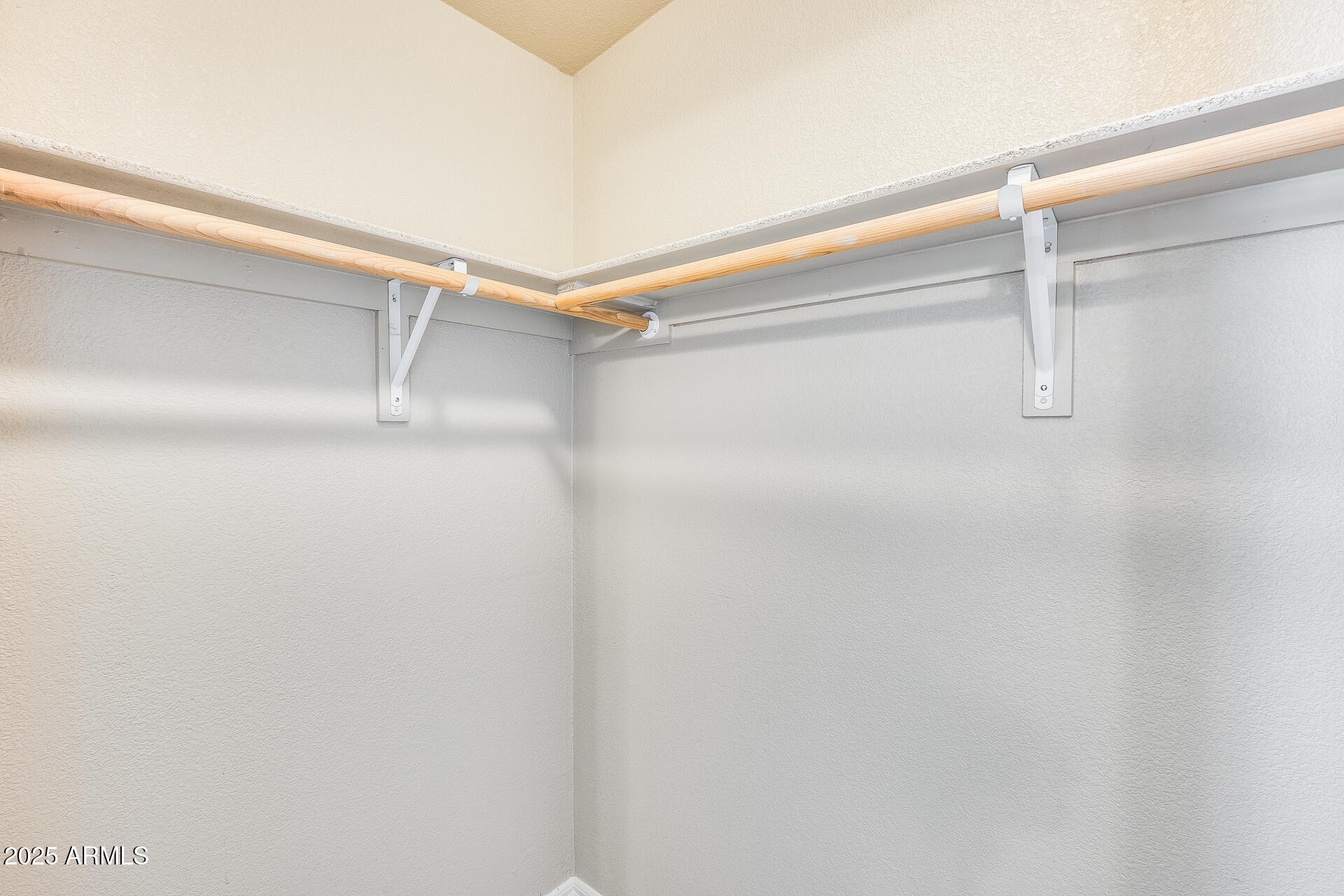 3301 South Goldfield Road, Unit 1043 Apache Junction, AZ 85119 - Photo 20 of 36 a view of an empty walk in closet