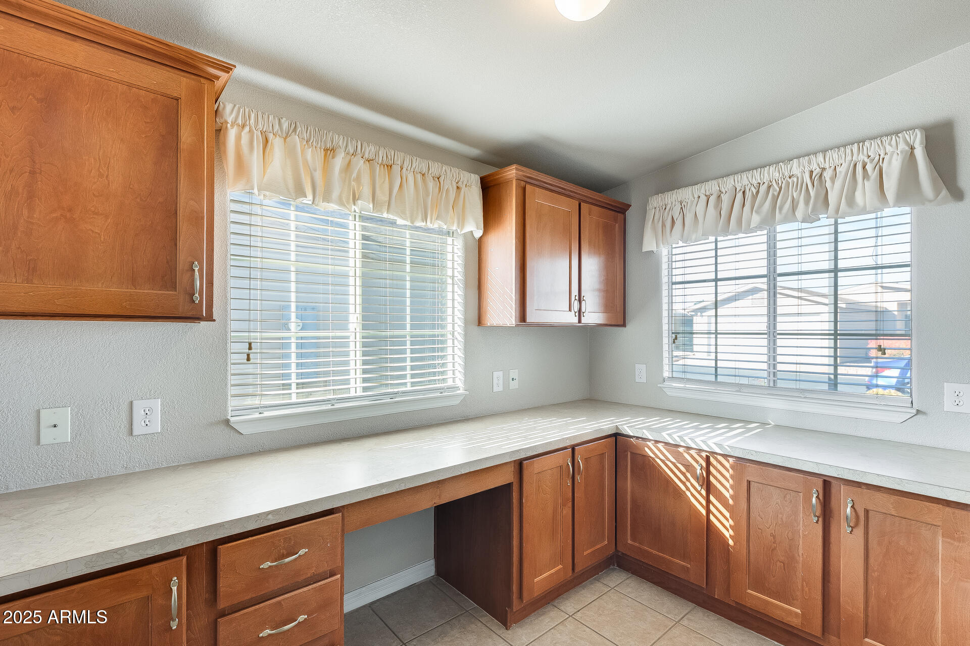 3301 South Goldfield Road, Unit 1043 Apache Junction, AZ 85119 - Photo 35 of 36 a kitchen with stainless steel appliances granite countertop a sink and a window
