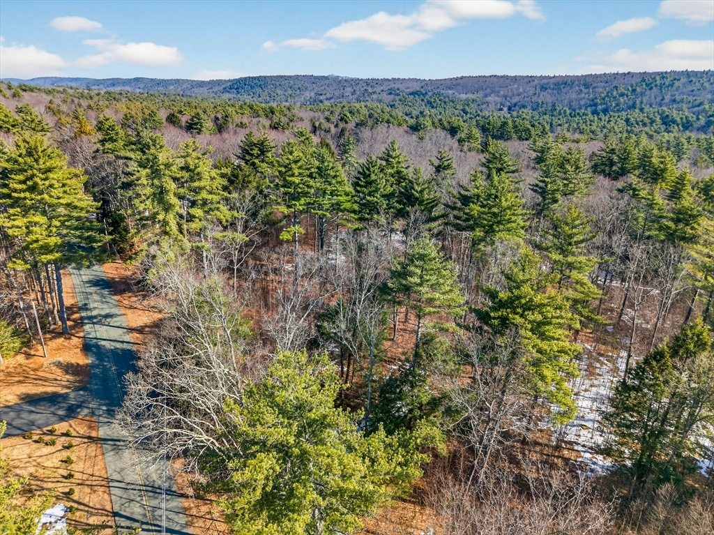 52 East Road Orange, MA 01364 - Photo 5 of 9 a view of a lake with mountains in the background