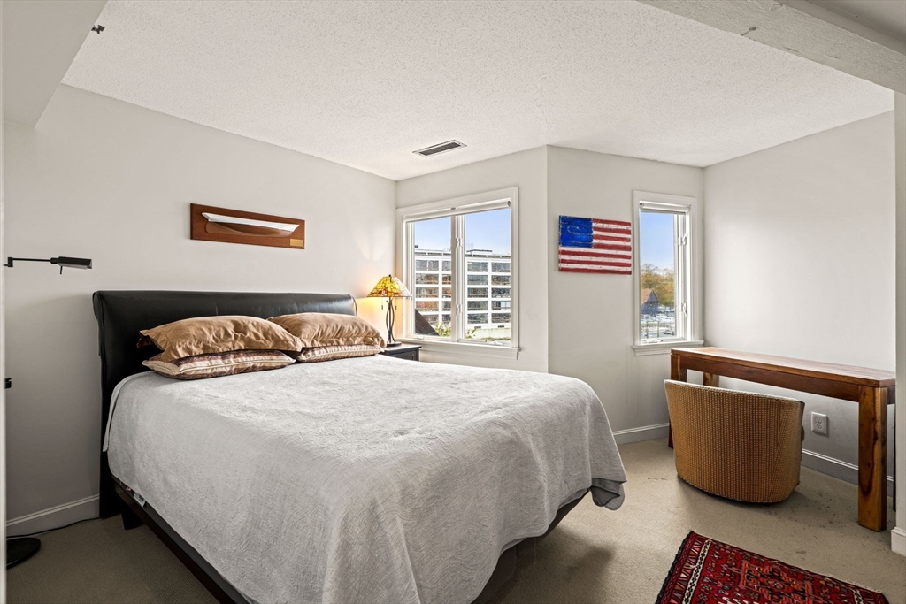 90 Wharf Street, Unit L10 Salem, MA 01970 - Photo 19 of 32 a bedroom with bed and window