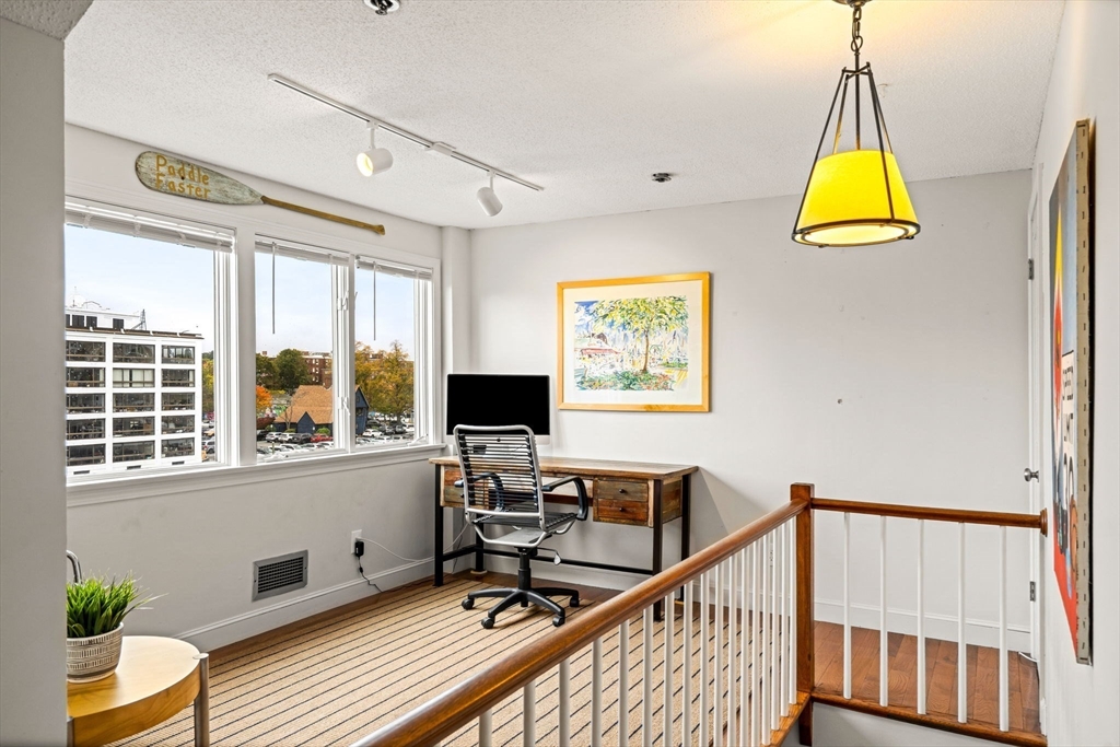 90 Wharf Street, Unit L10 Salem, MA 01970 - Photo 26 of 32 a view of a workspace with furniture and a window