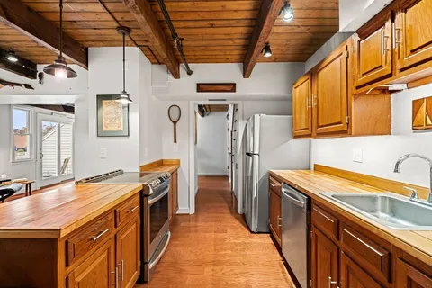a utility room with a sink a washer and dryer