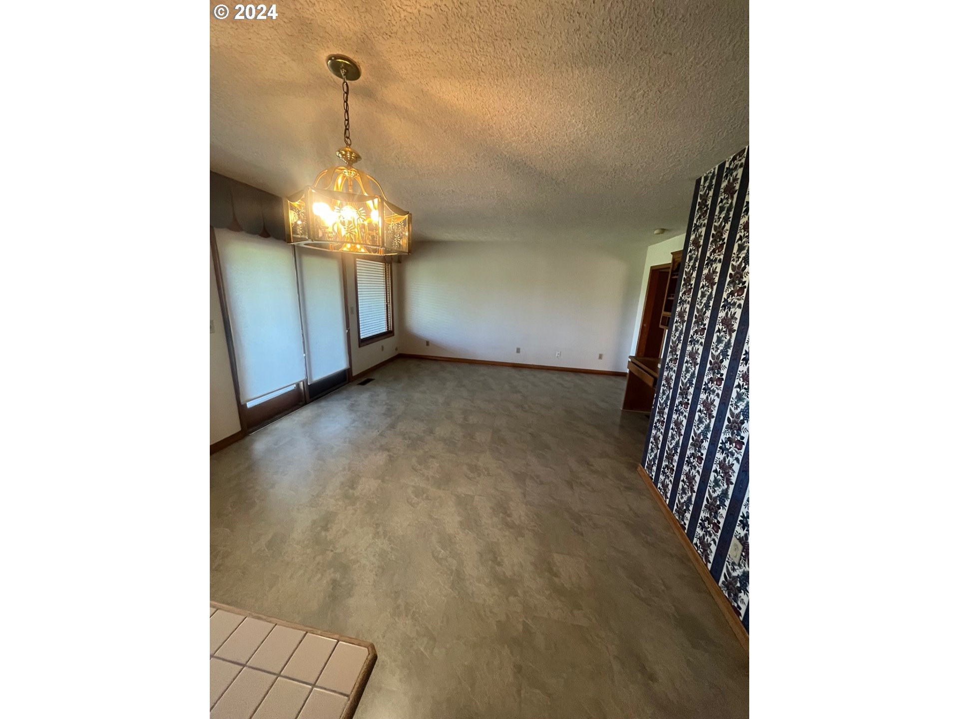 10755 Southeast 92nd Avenue Happy Valley, OR 97086 - Photo 14 of 40 a view of a chandelier fan in a room