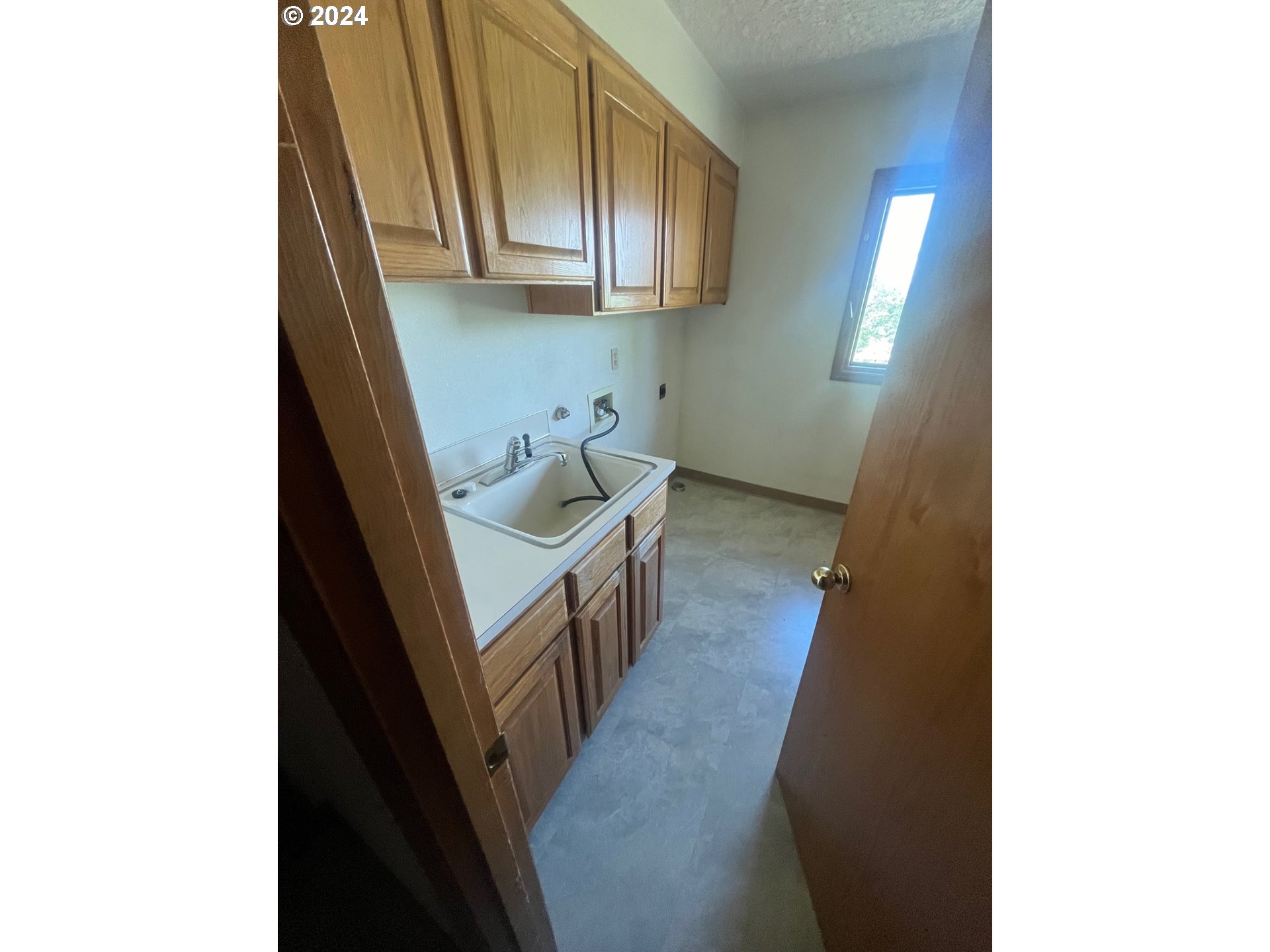 10755 Southeast 92nd Avenue Happy Valley, OR 97086 - Photo 17 of 40 a bathroom with a sink and a mirror