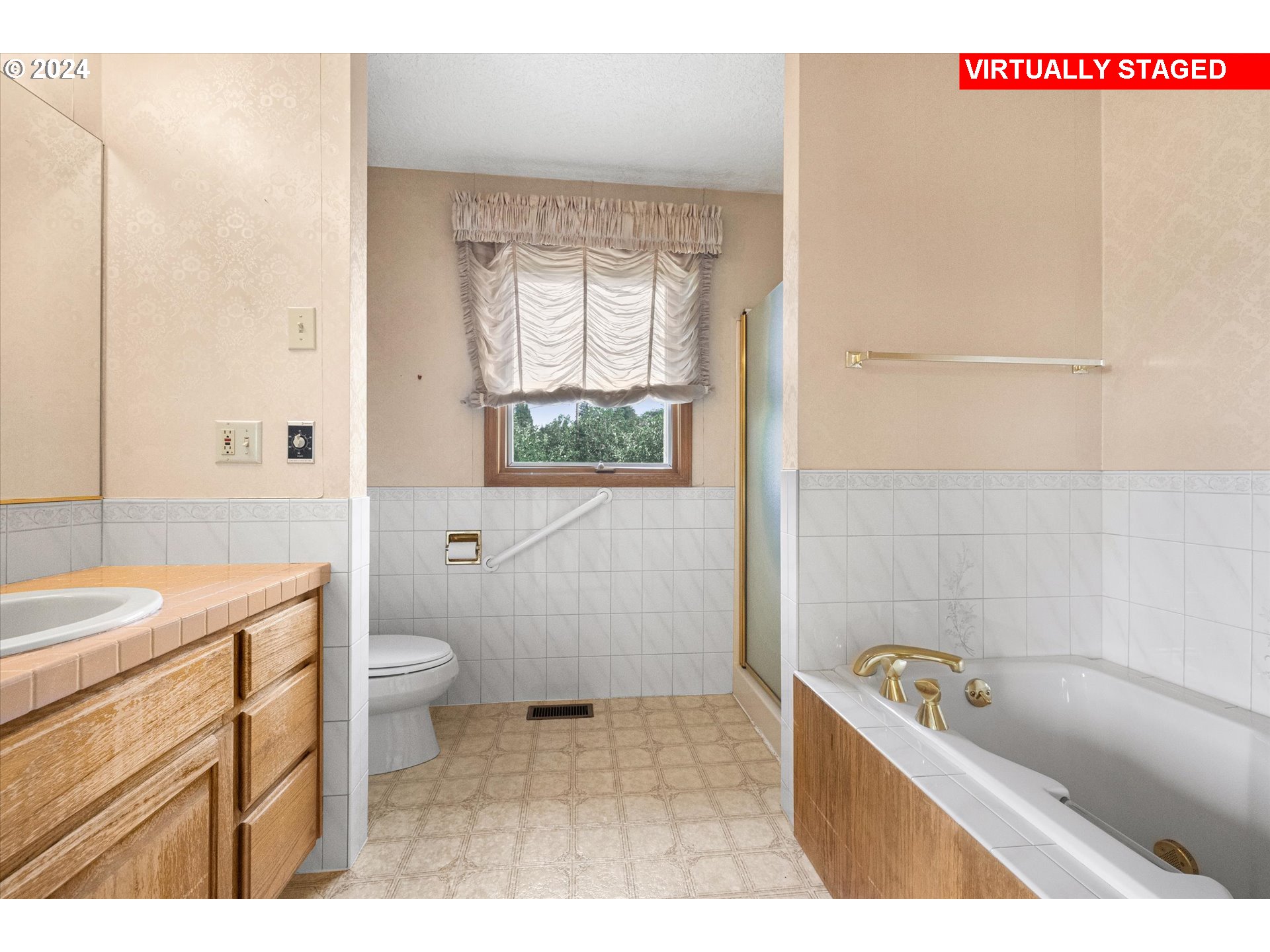 10755 Southeast 92nd Avenue Happy Valley, OR 97086 - Photo 20 of 40 a bathroom with a granite countertop sink a toilet and shower