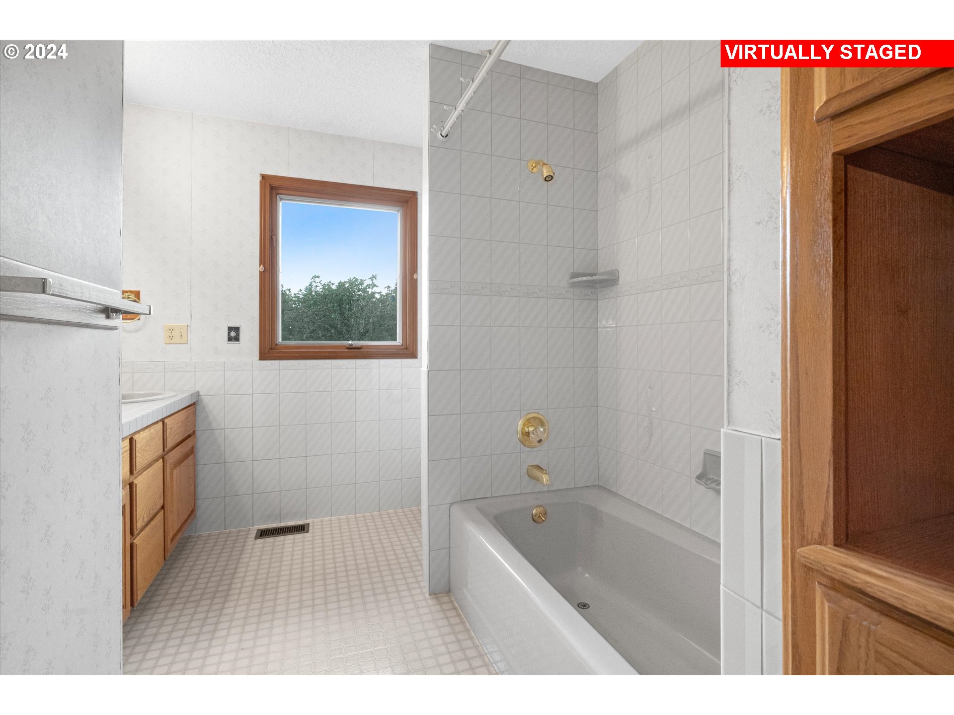 10755 Southeast 92nd Avenue Happy Valley, OR 97086 - Photo 21 of 40 a bathroom with a sink a toilet and shower