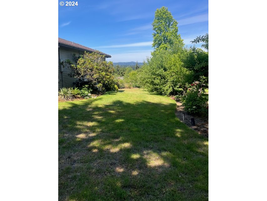 10755 Southeast 92nd Avenue Happy Valley, OR 97086 - Photo 5 of 40 a view of a yard