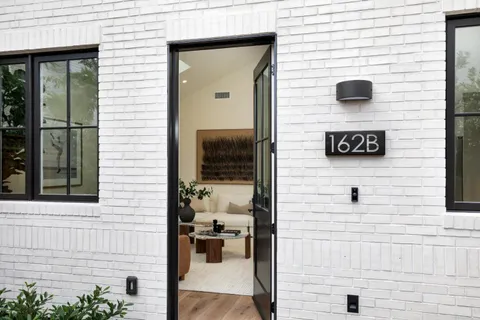 a view of sitting area in front of door