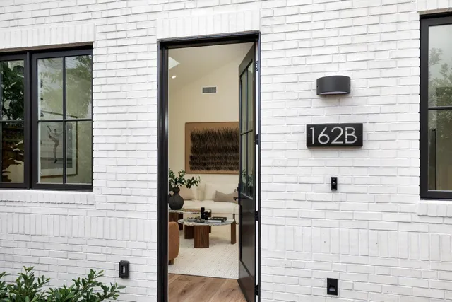 a view of sitting area in front of door